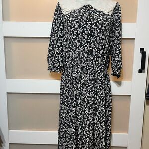 Chic Black and White Floral Dress with Lace Detail